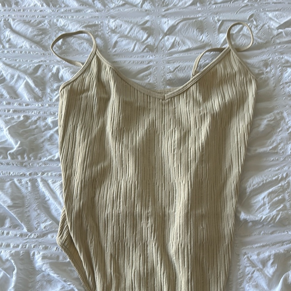 tan body suit
